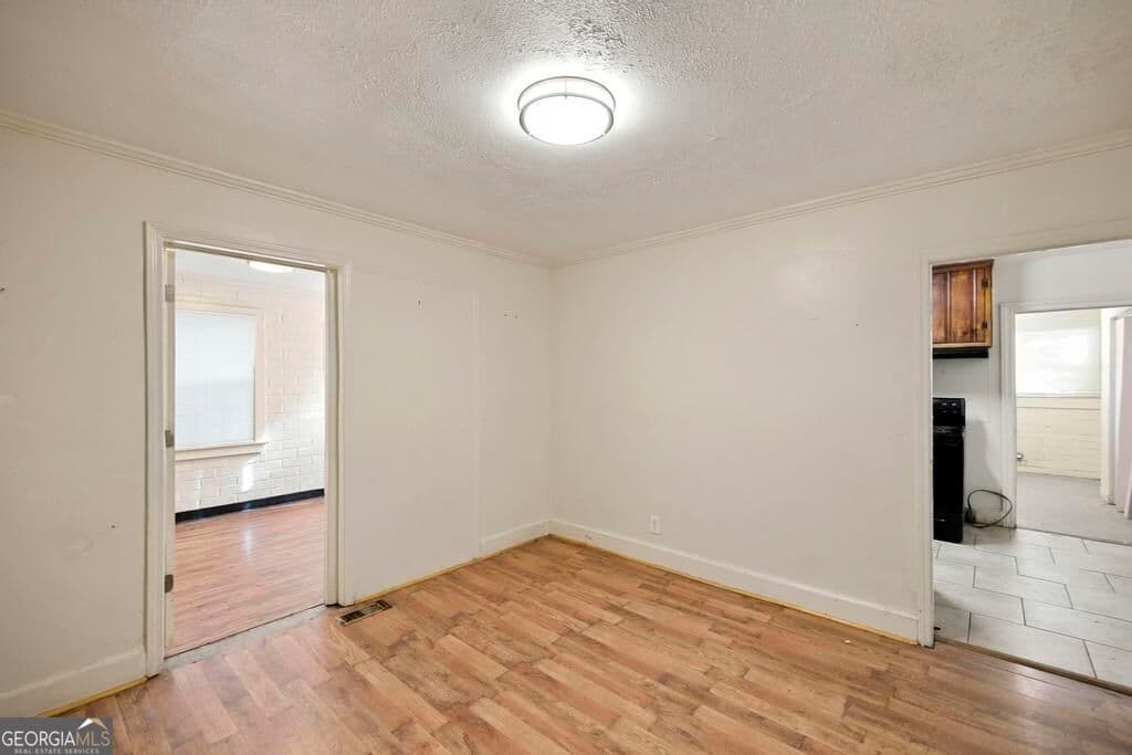 3 bedroom, 1 bathroom, 1,216 sq ft single family residence for sale at 1340 Burton Avenue, Macon, GA 31204 — photo 5