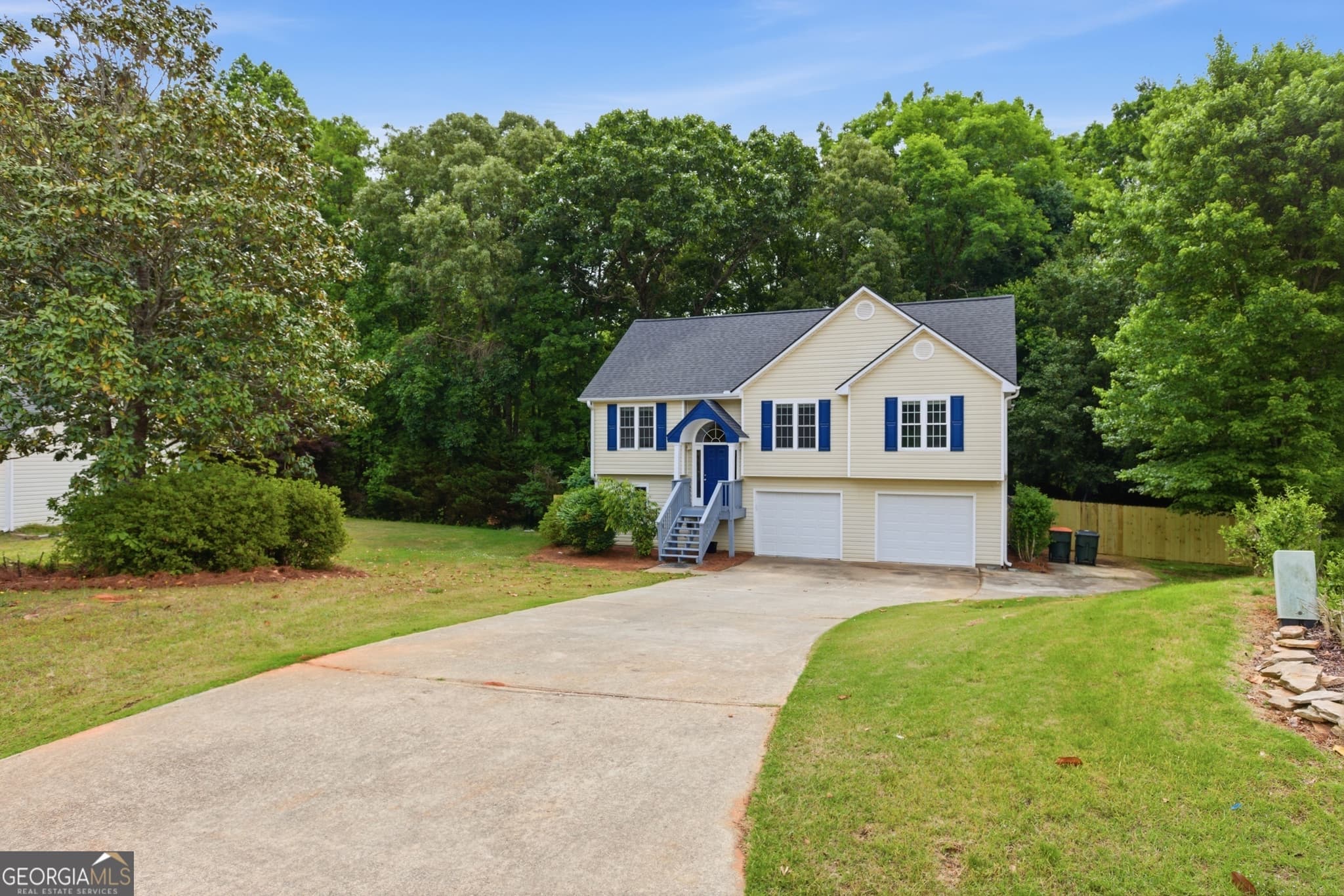 4 bedroom, 3 bathroom, 1,755 sq ft single family residence for sale at 1026 Carriage Way, Loganville, GA 30052 — photo 2