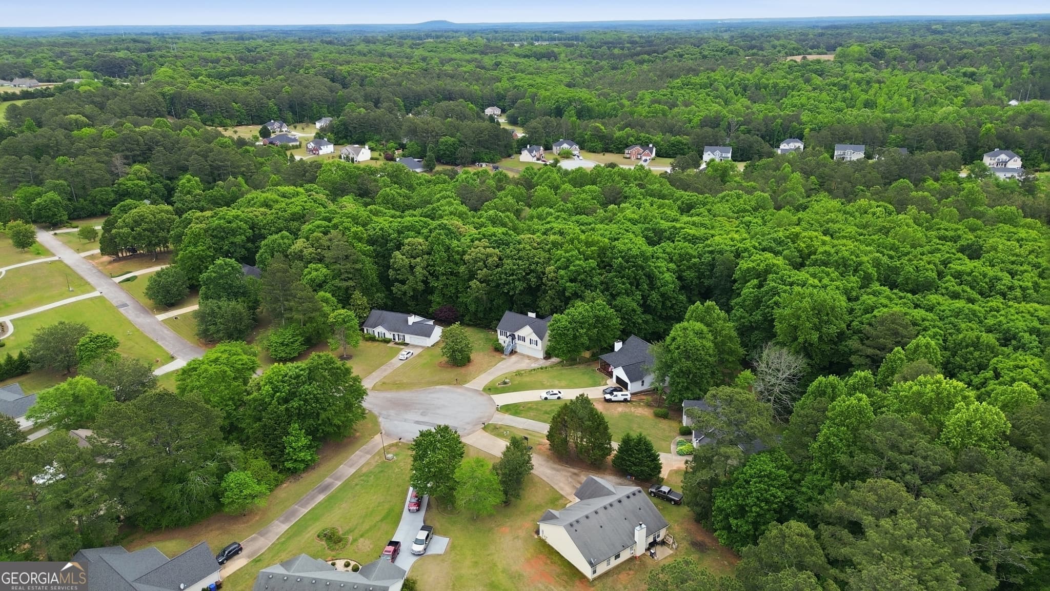 4 bedroom, 3 bathroom, 1,755 sq ft single family residence for sale at 1026 Carriage Way, Loganville, GA 30052 — photo 8