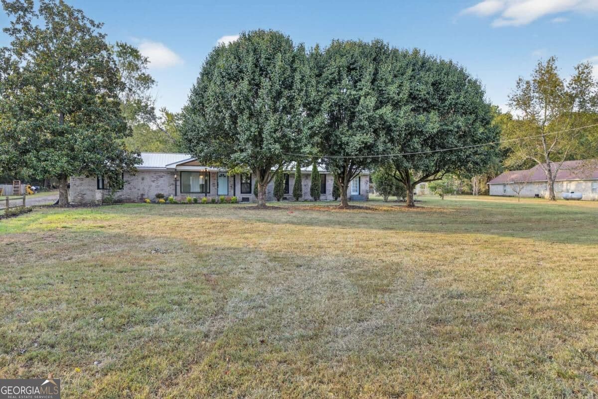 5 bedroom, 4 bathroom, 3,194 sq ft single family residence for sale at 1943 Rome Road, Calhoun, GA 30701 — photo 6