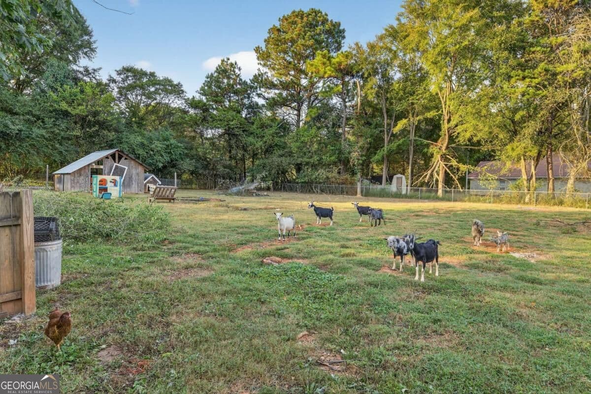 5 bedroom, 4 bathroom, 3,194 sq ft single family residence for sale at 1943 Rome Road, Calhoun, GA 30701 — photo 7