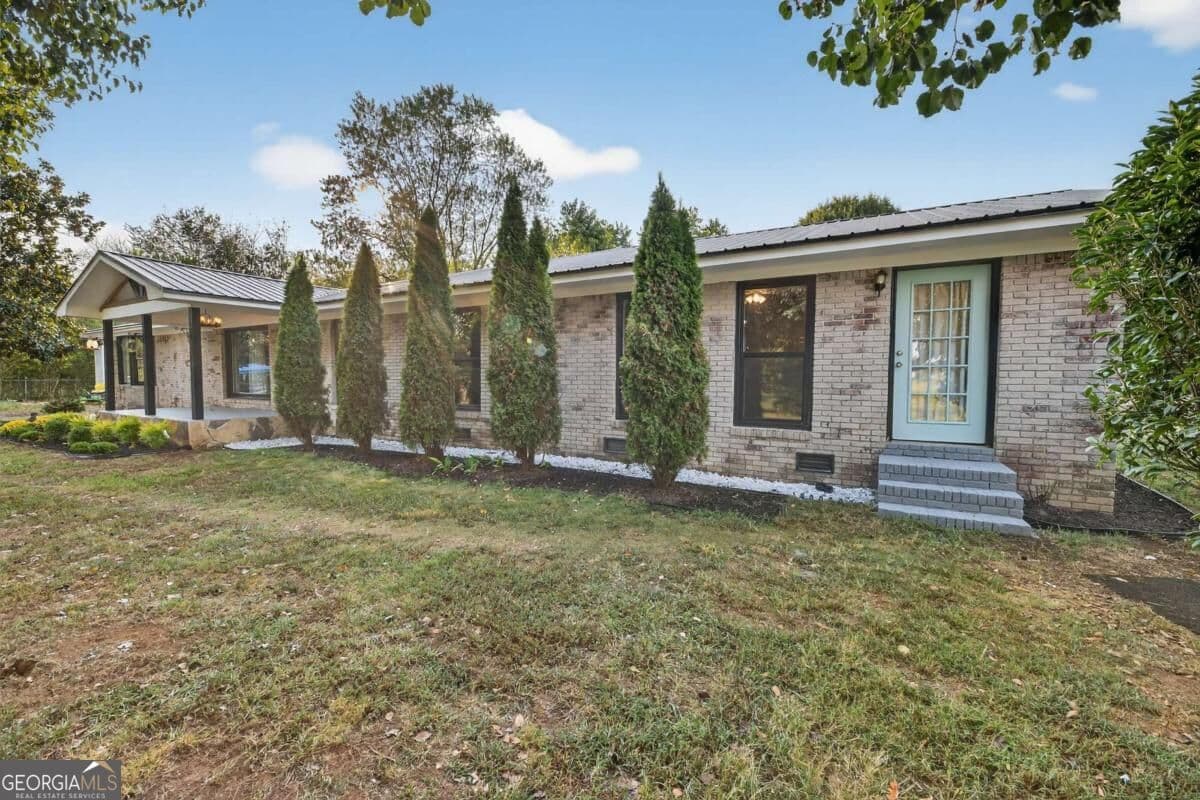 5 bedroom, 4 bathroom, 3,194 sq ft single family residence for sale at 1943 Rome Road, Calhoun, GA 30701 — photo 4