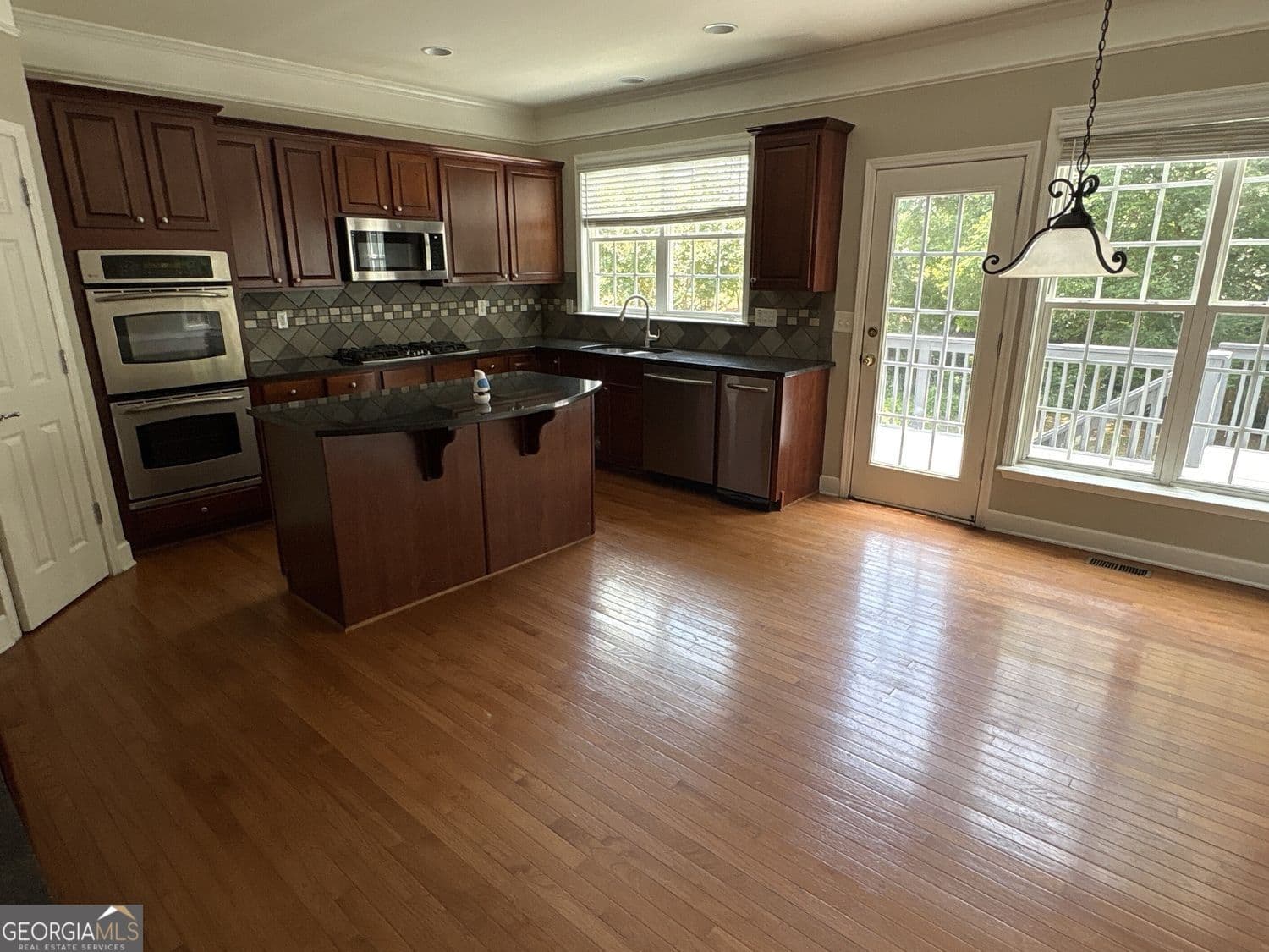 5 bedroom, 3.5 bathroom, 4,377 sq ft single family residence for sale at 315 Harmony Lake Drive, Canton, GA 30115 — photo 9