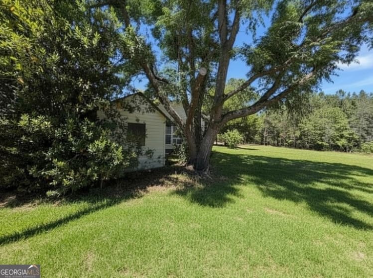 3 bedroom, 2 bathroom, 1,800 sq ft single family residence for sale at 560 Rabitsch Road, Millen, GA 30442 — photo 2