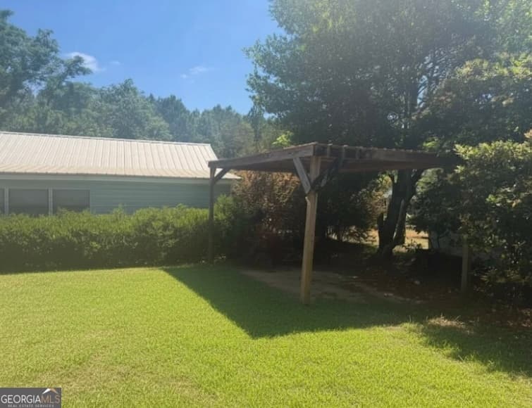 3 bedroom, 2 bathroom, 1,800 sq ft single family residence for sale at 560 Rabitsch Road, Millen, GA 30442 — photo 3