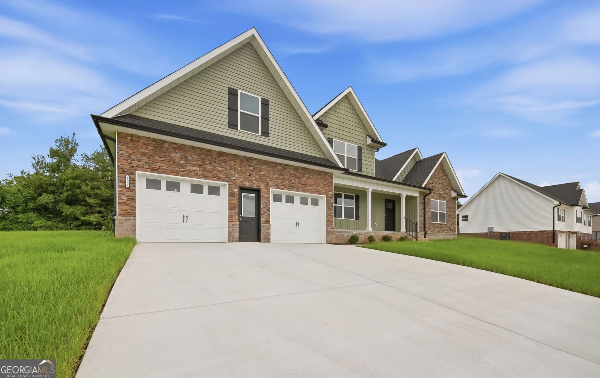 3 bedroom, 2.5 bathroom, 2,735 sq ft single family residence for sale at 8076 Abraham Lane, Ooltewah, TN 37363 — photo 2