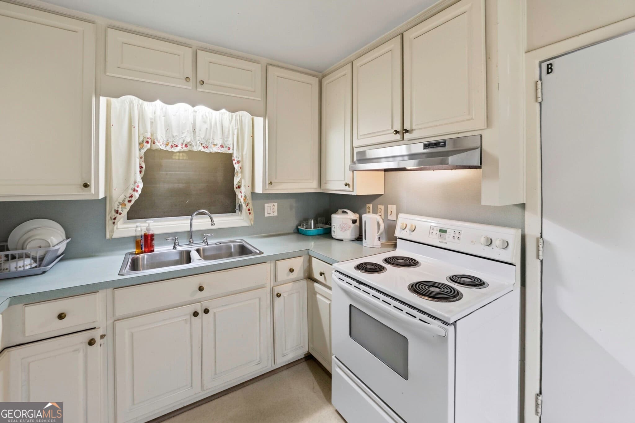 7 bedroom, 5 bathroom, 2,454 sq ft single family residence for sale at 3130 Stratford Arms Drive, Atlanta, GA 30341 — photo 10