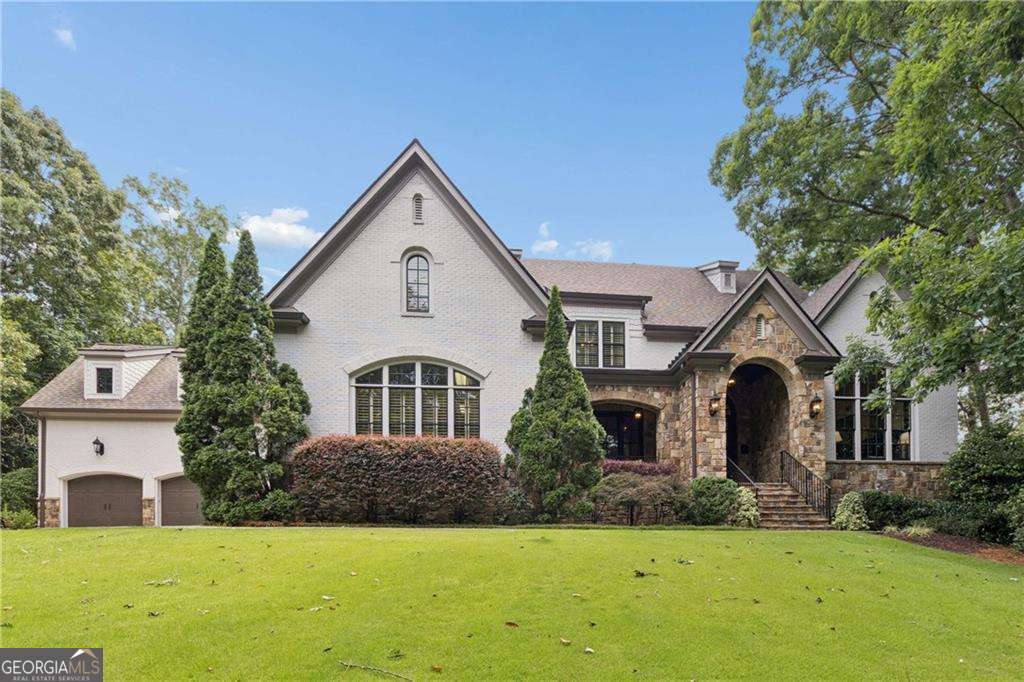 7 bedroom, 8 bathroom, 8,985 sq ft single family residence sold at 1024 Somerset Drive, Atlanta, GA 30327