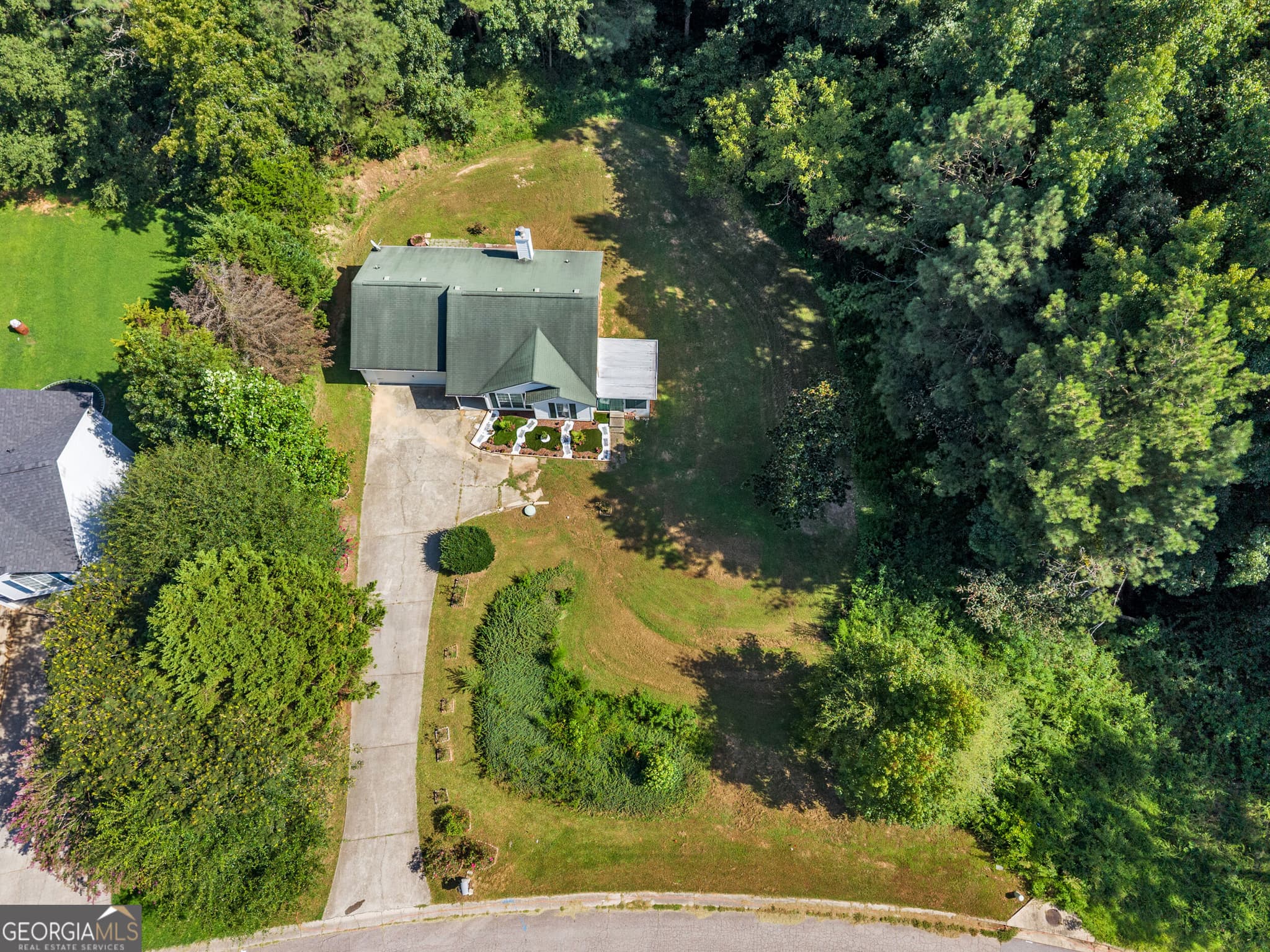 3 bedroom, 2 bathroom, 1,165 sq ft single family residence for sale at 3877 Deaton Road, Flowery Branch, GA 30542 — photo 4