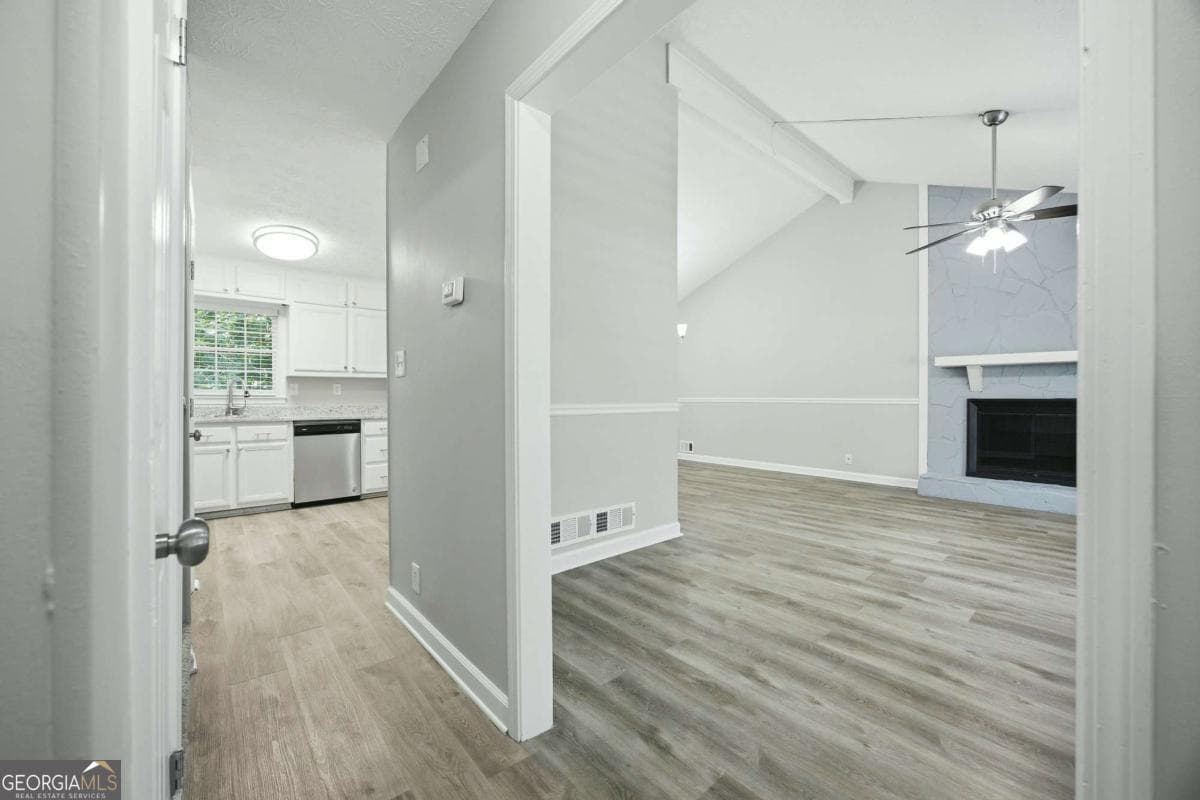 4 bedroom, 3 bathroom, 2,161 sq ft single family residence for sale at 458 Hearth Place, Lawrenceville, GA 30043 — photo 2