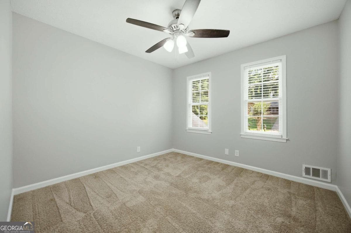 4 bedroom, 3 bathroom, 2,161 sq ft single family residence for sale at 458 Hearth Place, Lawrenceville, GA 30043 — photo 9