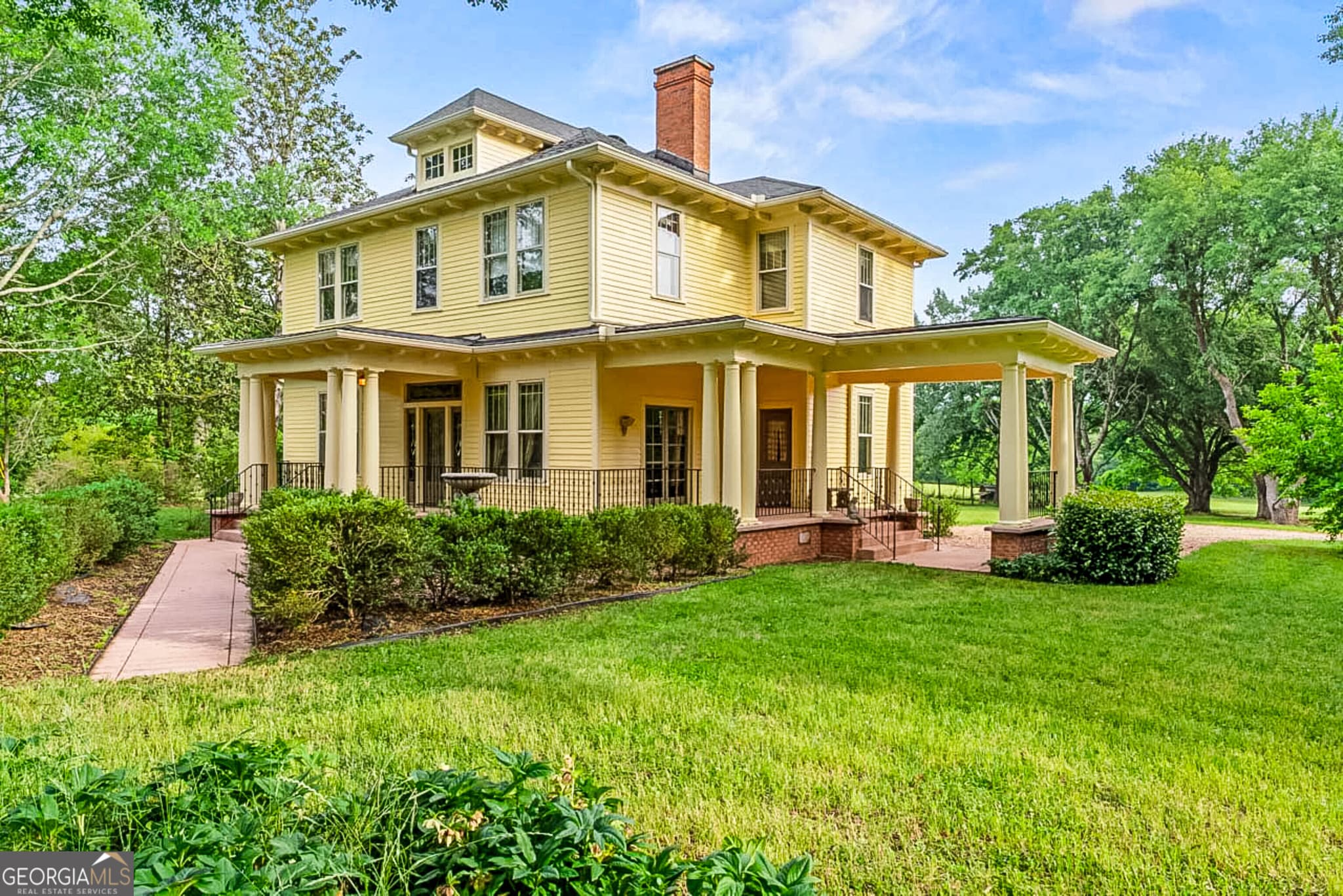 5 bedroom, 2 bathroom, 3,066 sq ft single family residence for sale at 3021 Teamon Road, Griffin, GA 30223 — photo 4