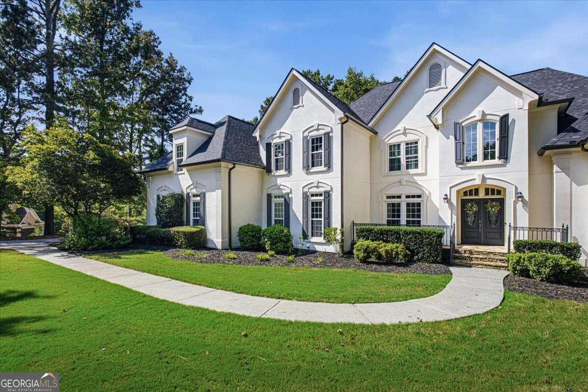 5 bedroom, 5.5 bathroom, 5,653 sq ft single family residence for sale at 115 Providence Lake Point, Milton, GA 30004 — photo 3