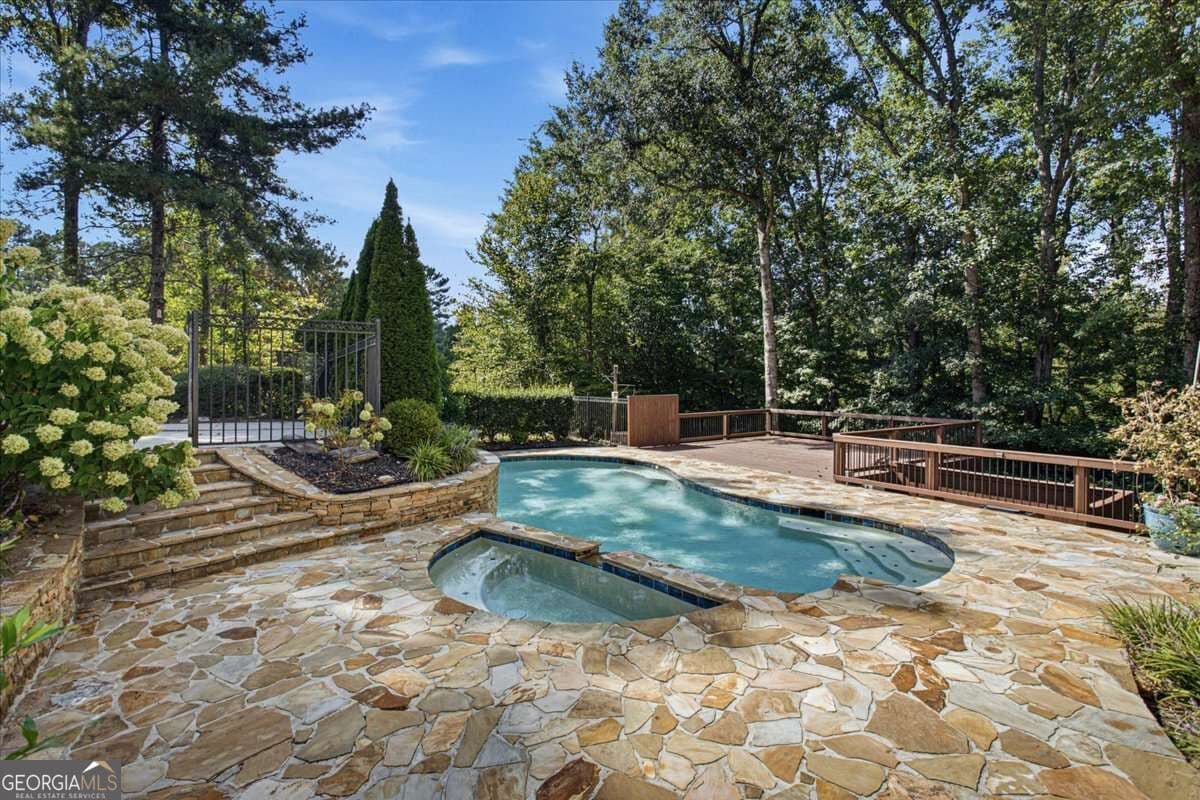 5 bedroom, 5.5 bathroom, 5,653 sq ft single family residence for sale at 115 Providence Lake Point, Milton, GA 30004 — photo 10