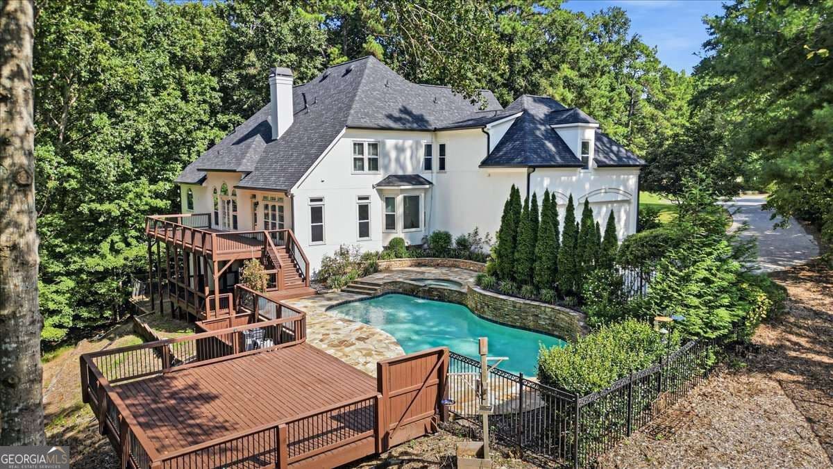 5 bedroom, 5.5 bathroom, 5,653 sq ft single family residence for sale at 115 Providence Lake Point, Milton, GA 30004 — photo 4