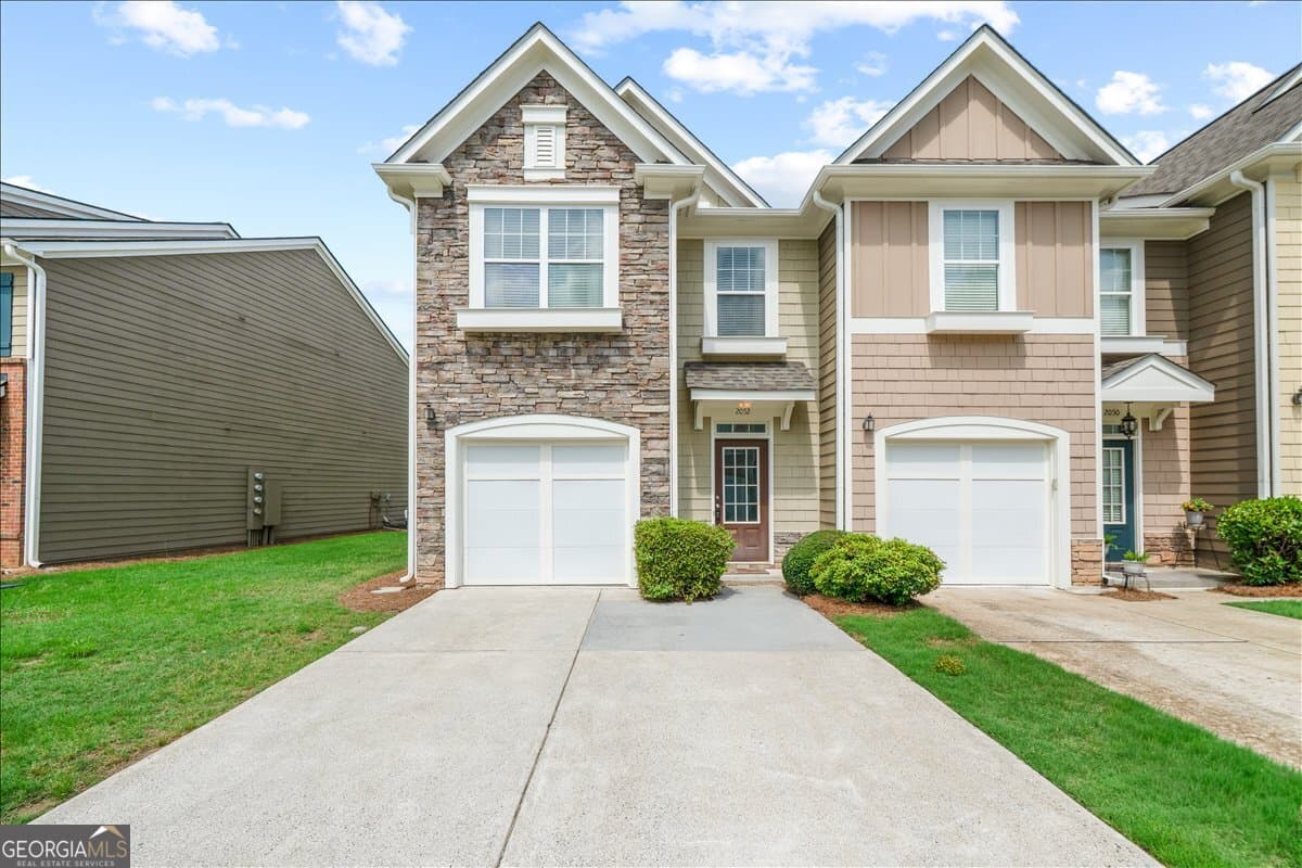 3 bedroom, 2.5 bathroom, 1,696 sq ft townhouse sold at 2052 Lakeshore Overlook Drive, Kennesaw, GA 30152