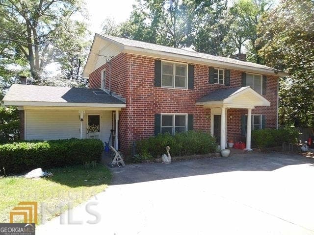 4 bedroom, 2 bathroom, 3,504 sq ft single family residence for sale at 573 Lester Road, Fayetteville, GA 30215 — photo 2