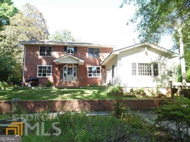 4 bedroom, 2 bathroom, 3,504 sq ft single family residence for sale at 573 Lester Road, Fayetteville, GA 30215 — photo 3