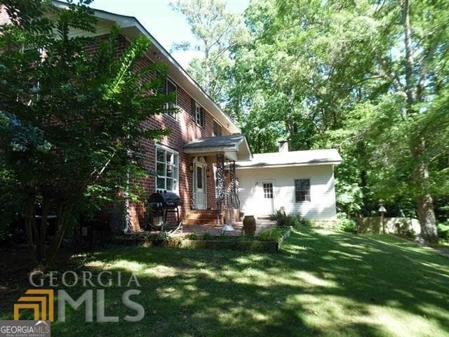 4 bedroom, 2 bathroom, 3,504 sq ft single family residence for sale at 573 Lester Road, Fayetteville, GA 30215 — photo 4