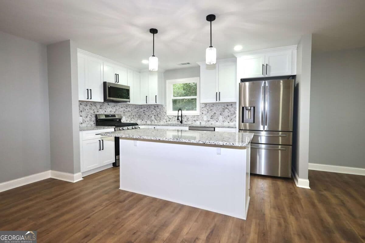 3 bedroom, 2 bathroom, 1,315 sq ft single family residence for sale at 3941 Canterbury Walk, Douglasville, GA 30135 — photo 6