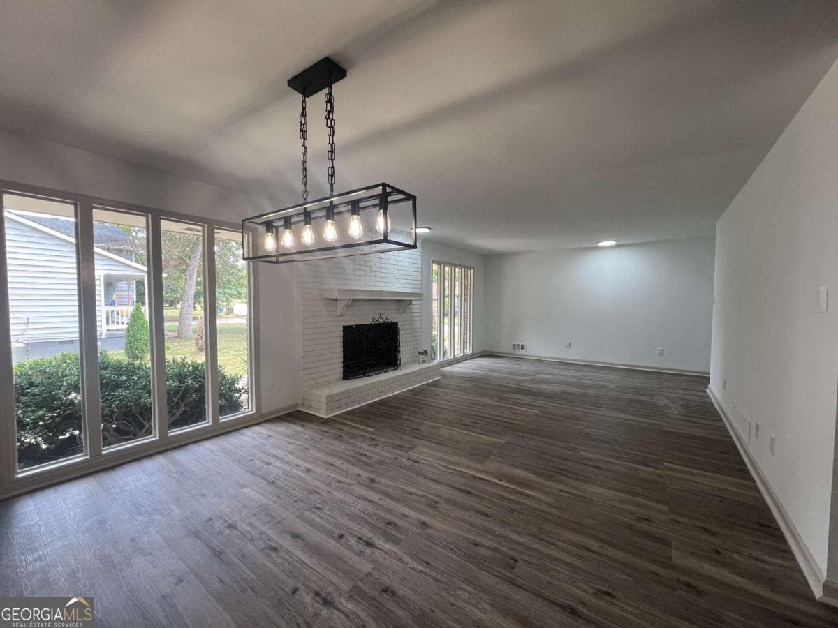 5 bedroom, 3 bathroom, 2,352 sq ft single family residence for rent at 5760 Penfield Place, Atlanta, GA 30349 for $3,200 a month — photo 5