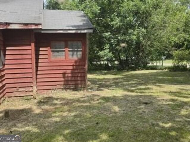 4 bedroom, 1 bathroom, 2,024 sq ft single family residence for sale at 209 Justice Avenue, Fitzgerald, GA 31750 — photo 2