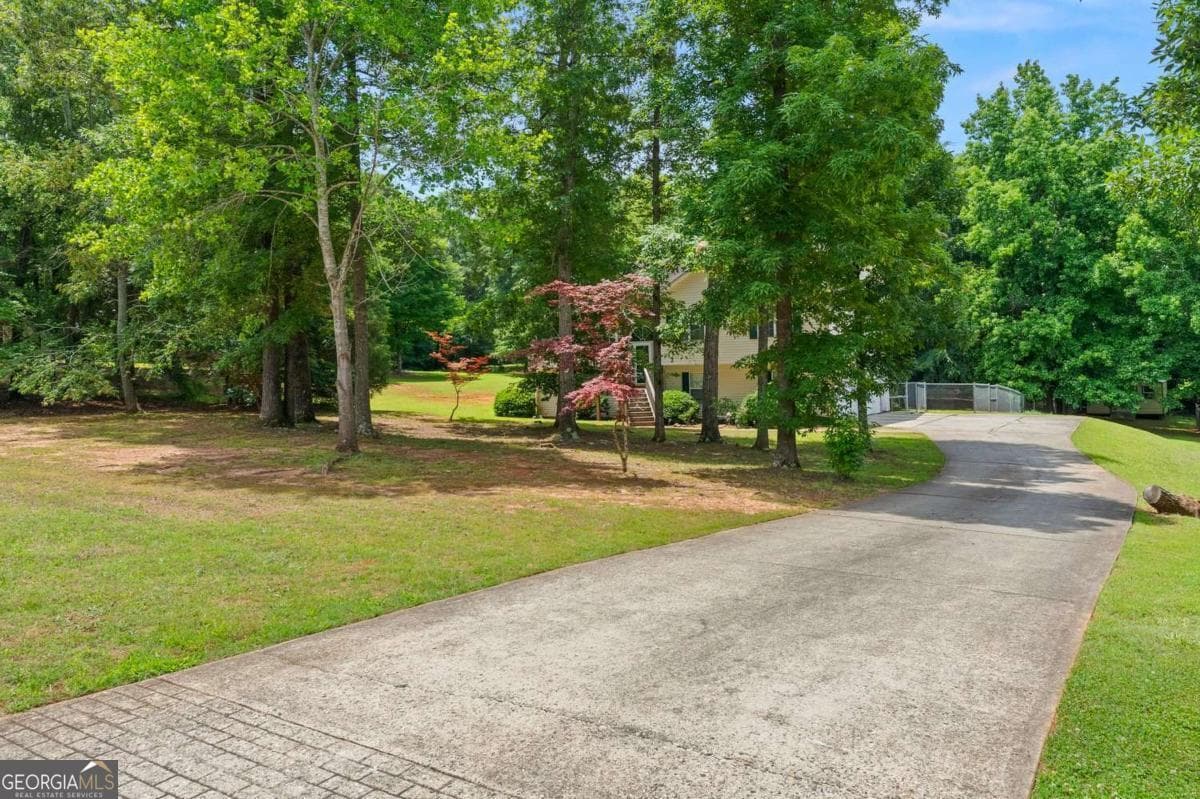 5 bedroom, 3 bathroom, 2,188 sq ft single family residence for sale at 223 Sawdust Trail, Nicholson, GA 30565 — photo 2