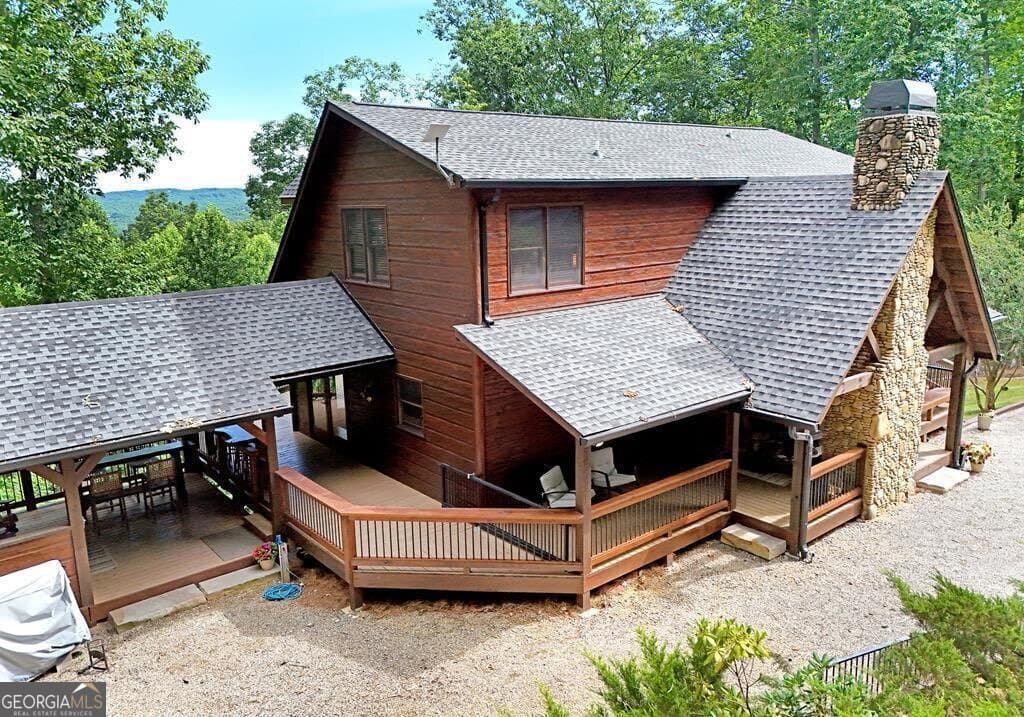 5 bedroom, 3.5 bathroom, 3,140 sq ft cabin,single family residence for sale at 71 High Country Lane, Morganton, GA 30560 — photo 2