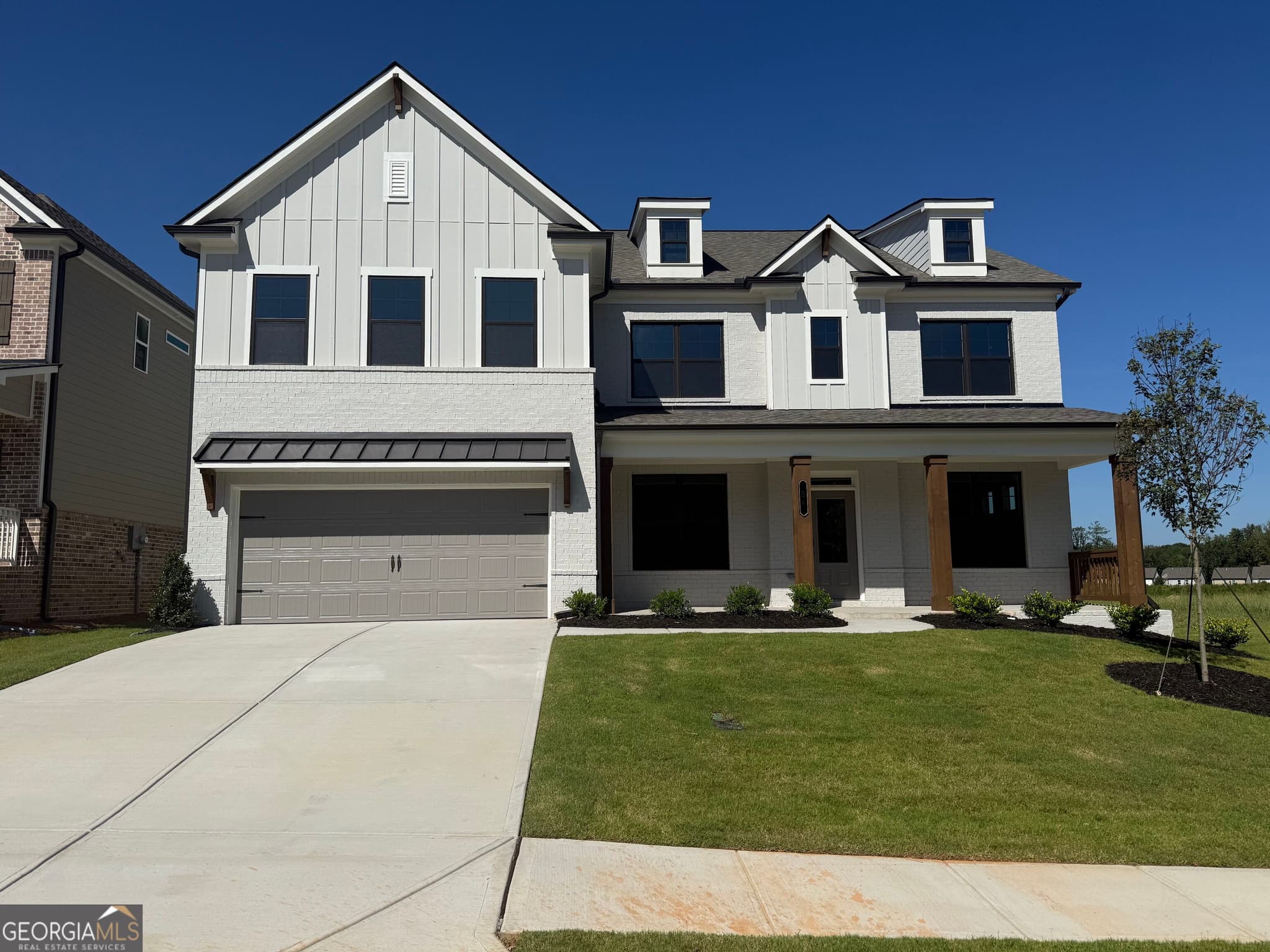 5 bedroom, 4 bathroom, 3,530 sq ft single family residence for sale at 94 Chickadee Court, Auburn, GA 30011 — photo 1 of 91