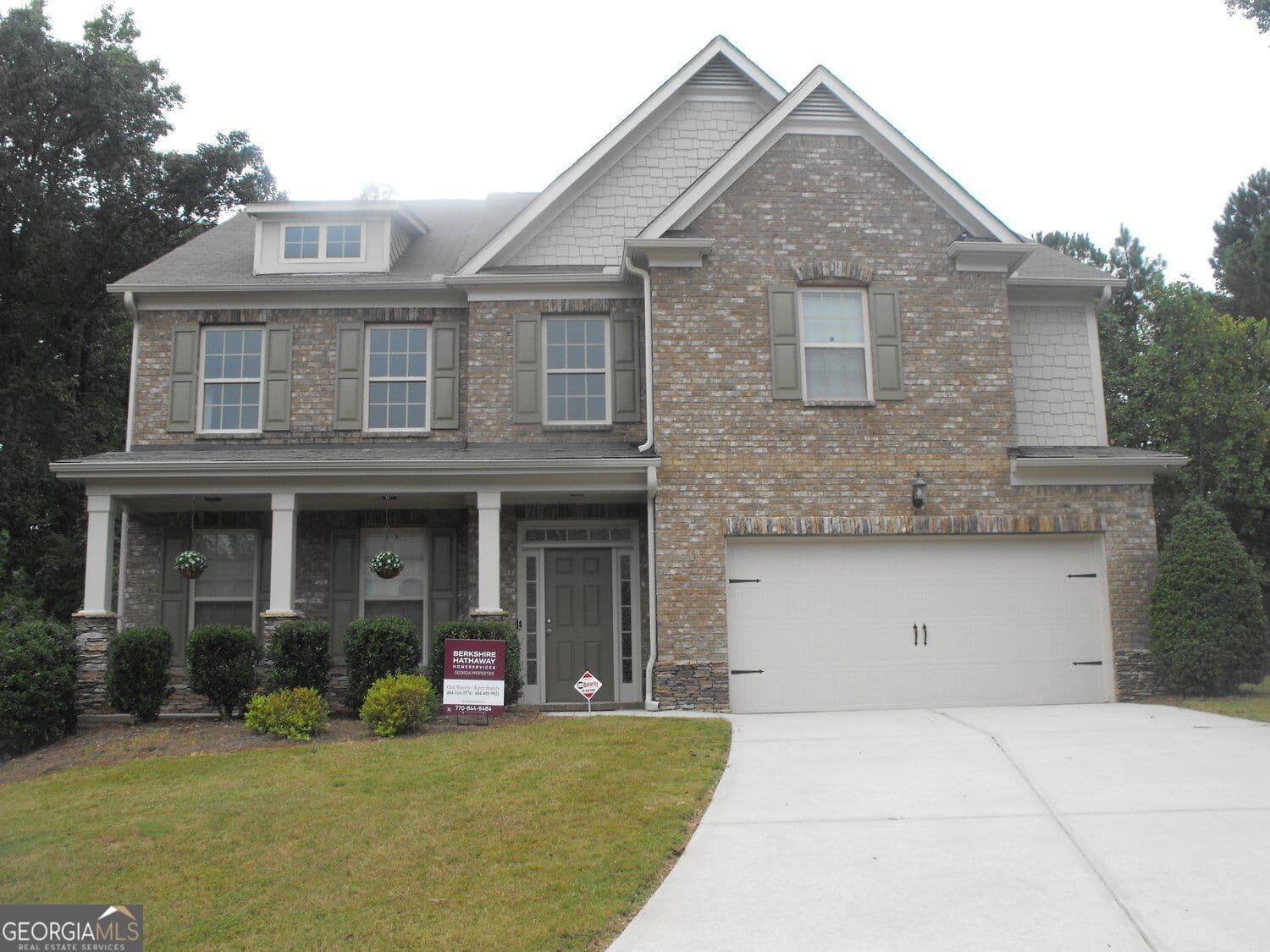 7 bedroom, 5 bathroom, 4,289 sq ft single family residence for sale at 4289 Amberleaf Walk, Lilburn, GA 30047 — photo 1 of 25