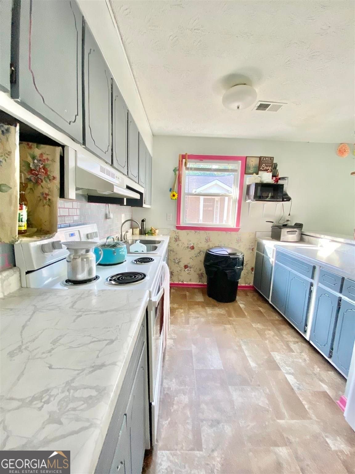 3 bedroom, 1 bathroom, 936 sq ft single family residence for sale at 1238 Mill Street, Gainesville, GA 30501 — photo 5