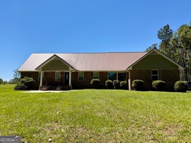 4 bedroom, 3 bathroom, 2,418 sq ft single family residence for sale at 1102 Morgan Road, Metter, GA 30439 — photo 2