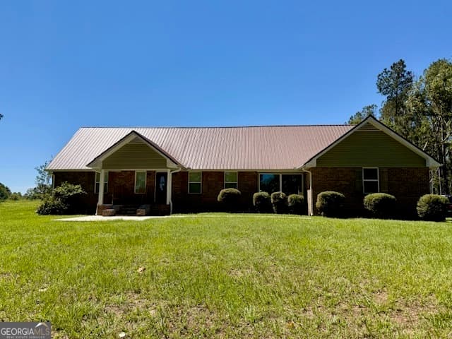 4 bedroom, 3 bathroom, 2,418 sq ft single family residence for sale at 1102 Morgan Road, Metter, GA 30439 — photo 1 of 56
