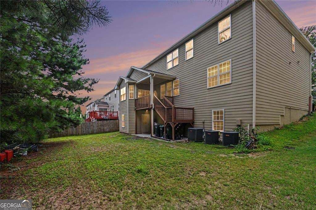 6 bedroom, 3.5 bathroom, 3,551 sq ft single family residence for sale at 6195 Park Leaf Walk, Buford, GA 30518 — photo 3