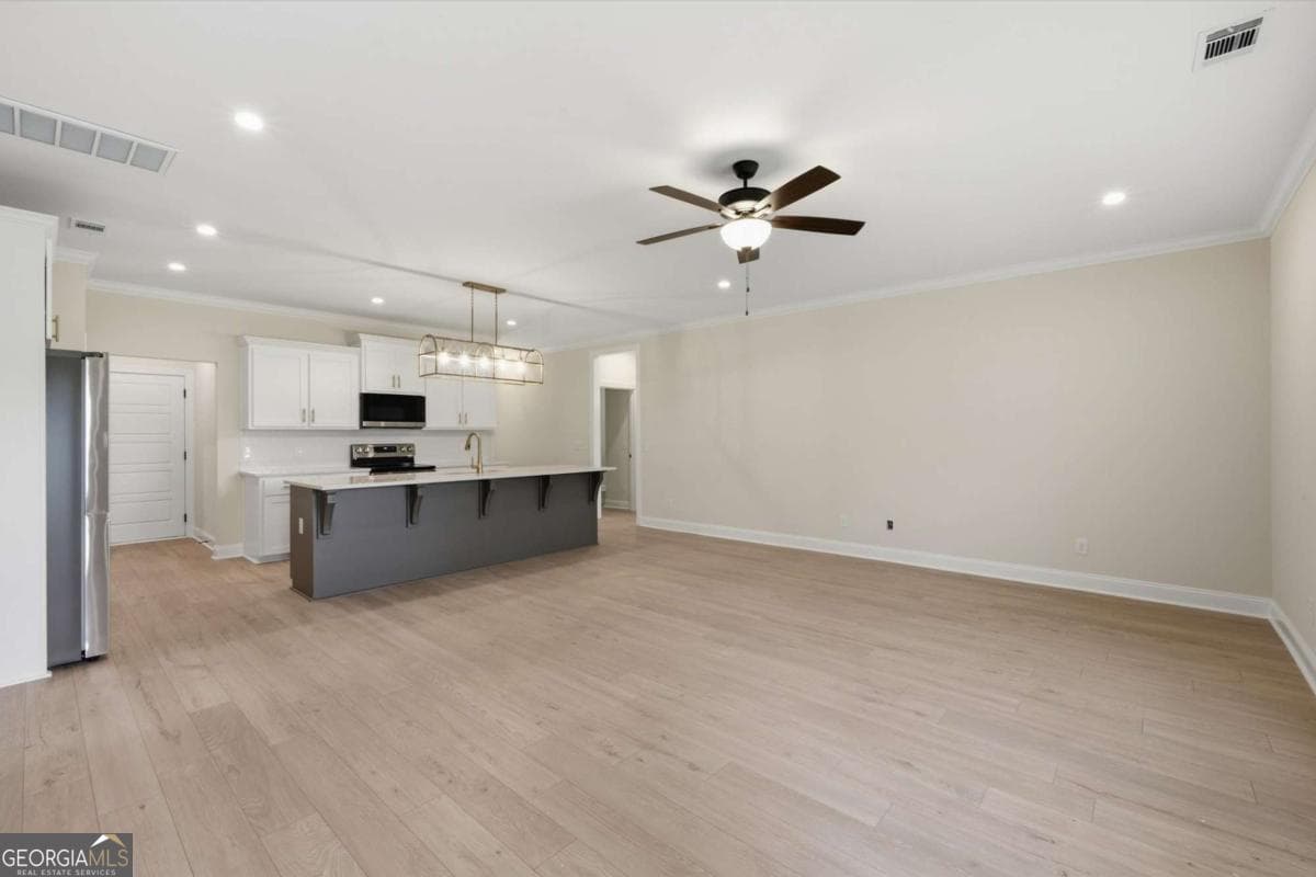 4 bedroom, 2 bathroom, 1,663 sq ft single family residence for sale at 93 Ennis Road, Pembroke, GA 31321 — photo 5