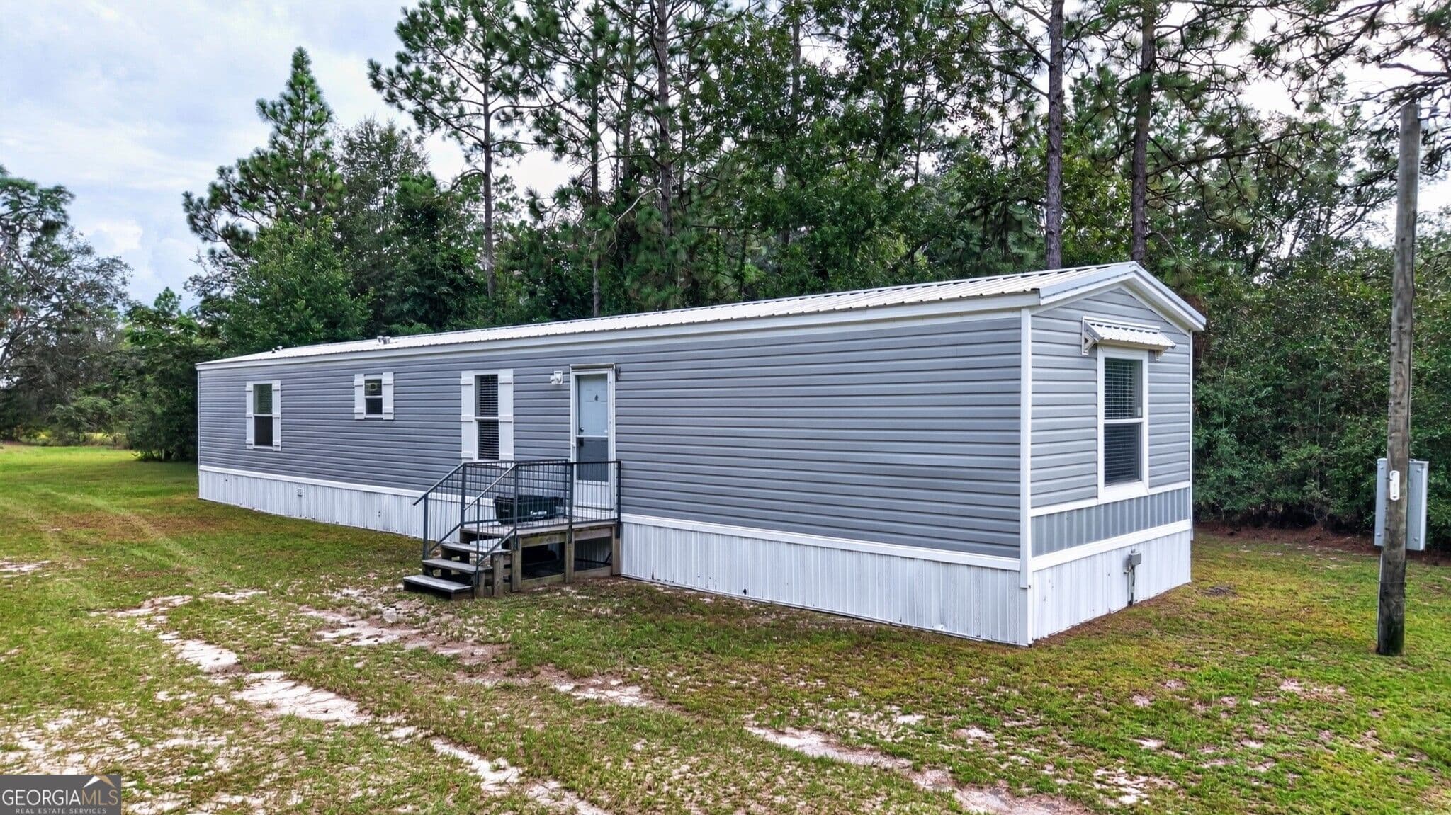 3 bedroom, 2 bathroom, 1,280 sq ft single family residence for sale at 901 Joy Bluff Road, Reidsville, GA 30453 — photo 1 of 42