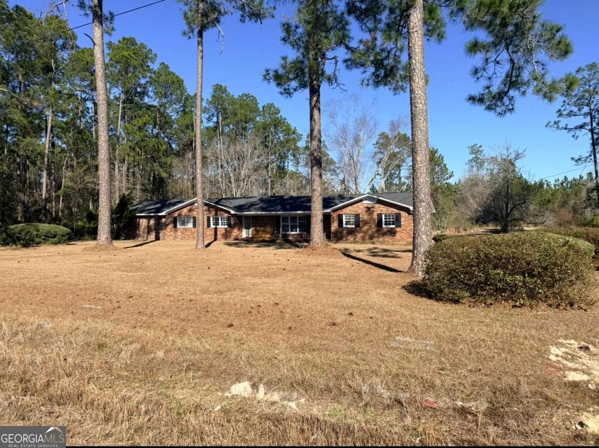 5 bedroom, 4 bathroom, 3,102 sq ft single family residence for sale at 2993 Golden Isle, Baxley, GA 31513 — photo 2