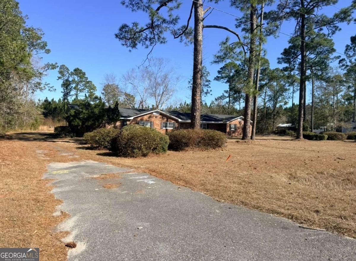 5 bedroom, 4 bathroom, 3,102 sq ft single family residence for sale at 2993 Golden Isle, Baxley, GA 31513 — photo 3