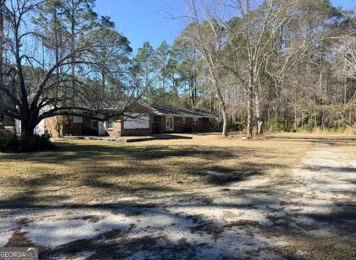 5 bedroom, 4 bathroom, 3,102 sq ft single family residence for sale at 2993 Golden Isle, Baxley, GA 31513 — photo 4