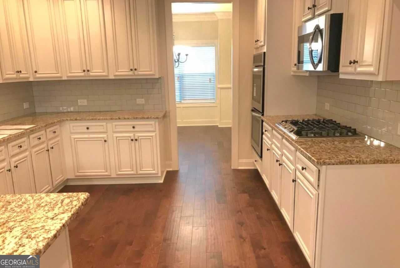 5 bedroom, 3 bathroom, 3,376 sq ft single family residence for sale at 4050 Madison Acres Drive, Locust Grove, GA 30248 — photo 9