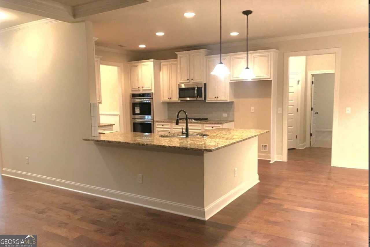 5 bedroom, 3 bathroom, 3,376 sq ft single family residence for sale at 4050 Madison Acres Drive, Locust Grove, GA 30248 — photo 8