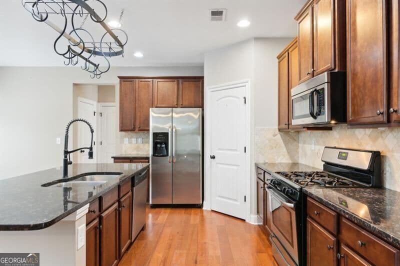 4 bedroom, 3.5 bathroom, 2,954 sq ft single family residence for rent at 4925 4th Rail Lane, Cumming, GA 30040 for $2,700 a month — photo 6