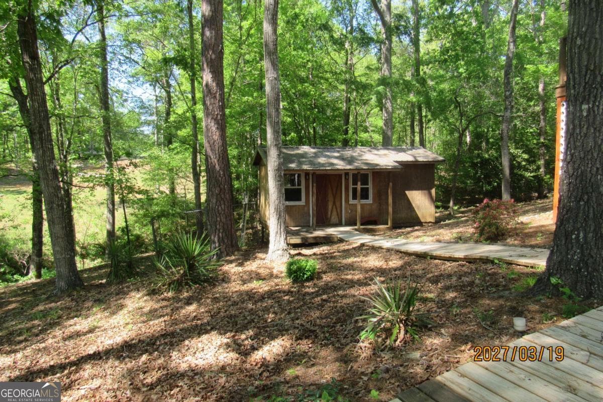4 bedroom, 2 bathroom manufactured home,single family residence for sale at 117 Doe Trail, Sparta, GA 31087 — photo 4