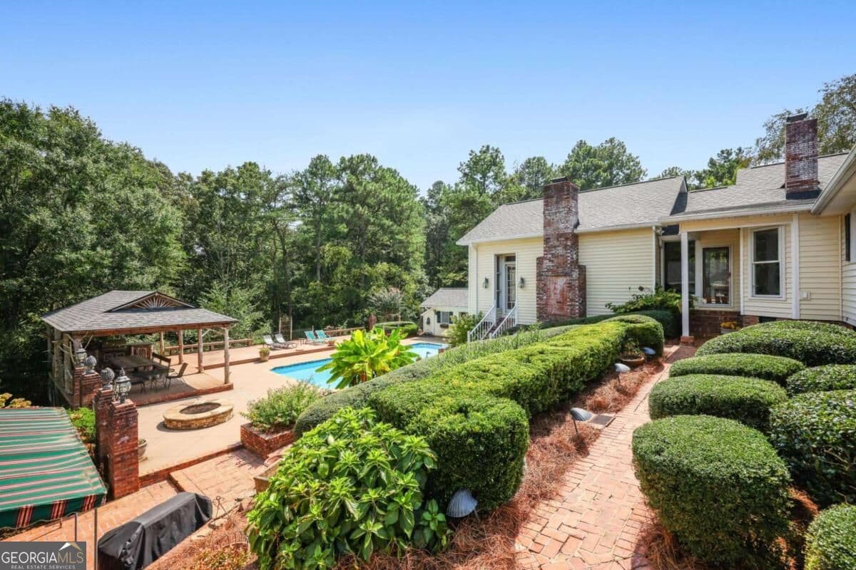 4 bedroom, 3.5 bathroom, 4,212 sq ft single family residence for sale at 4998 Old Dalton Road, Rome, GA 30165 — photo 5
