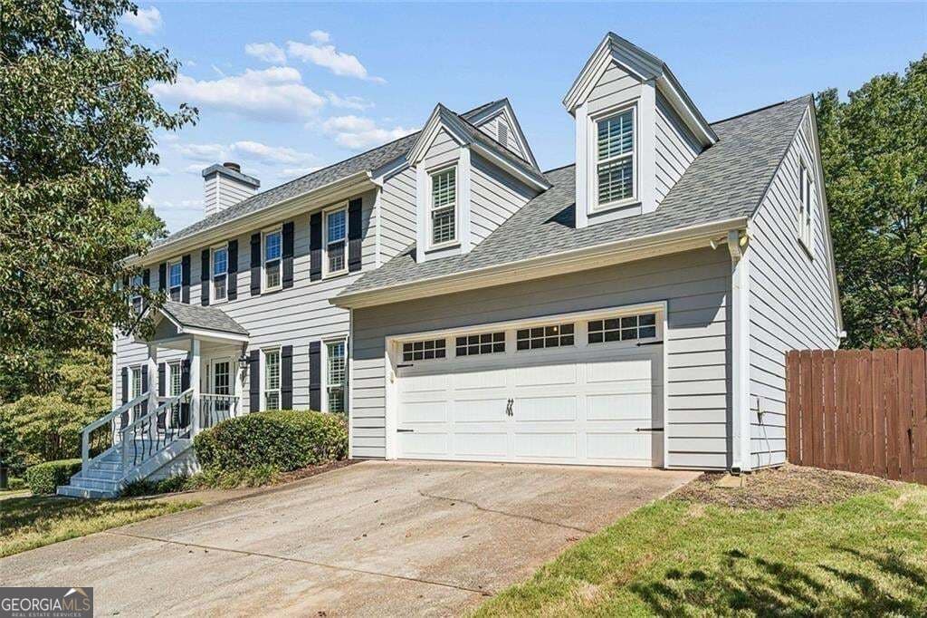4 bedroom, 2.5 bathroom, 2,210 sq ft single family residence for sale at 939 Flowers Crossing, Lawrenceville, GA 30044 — photo 2