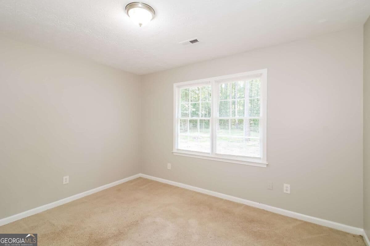 3 bedroom, 2 bathroom, 1,281 sq ft single family residence for sale at 8605 Collins Drive, Jonesboro, GA 30236 — photo 10