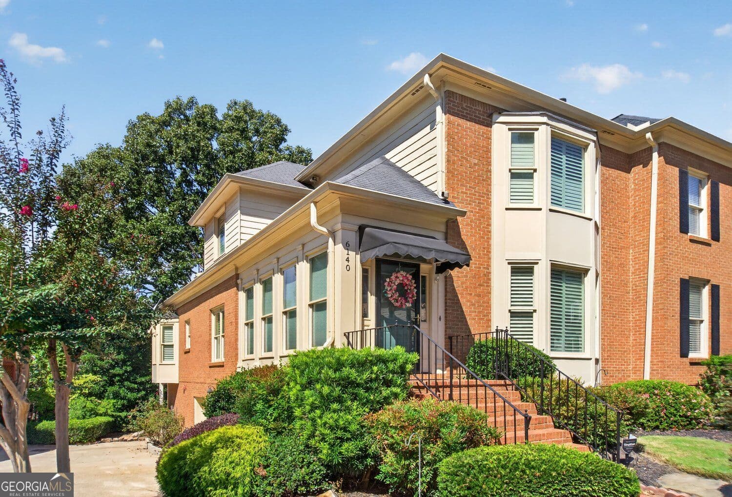 3 bedroom, 4 bathroom, 4,769 sq ft townhouse for sale at 6140 Forest Hills Drive, Peachtree Corners, GA 30092 — photo 2