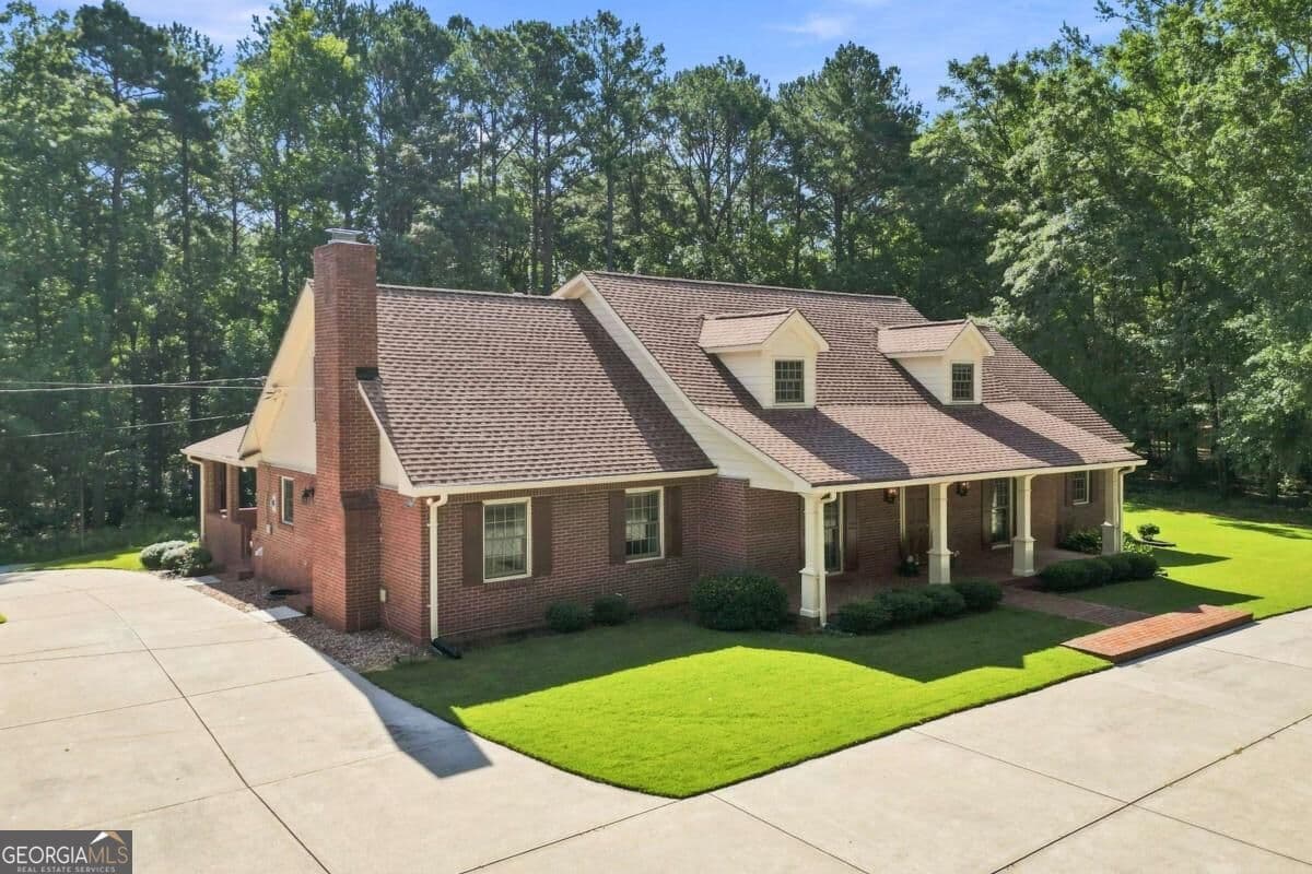 4 bedroom, 3 bathroom, 3,372 sq ft single family residence for sale at 2741 Highway 212, Conyers, GA 30094 — photo 2