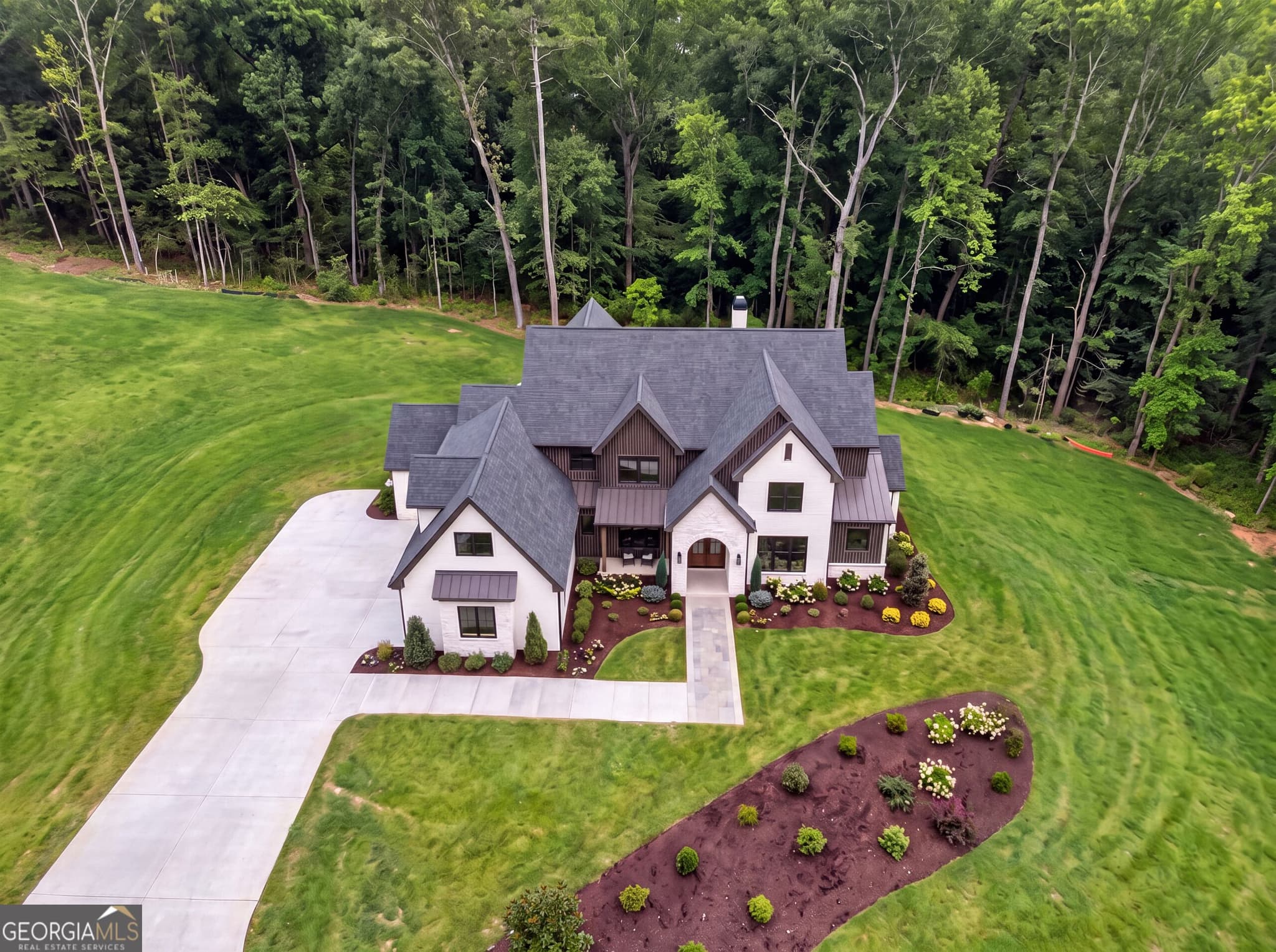 5 bedroom, 4.5 bathroom, 5,799 sq ft single family residence for sale at 616 Hoke Okelly Mill Road, Loganville, GA 30052 — photo 6