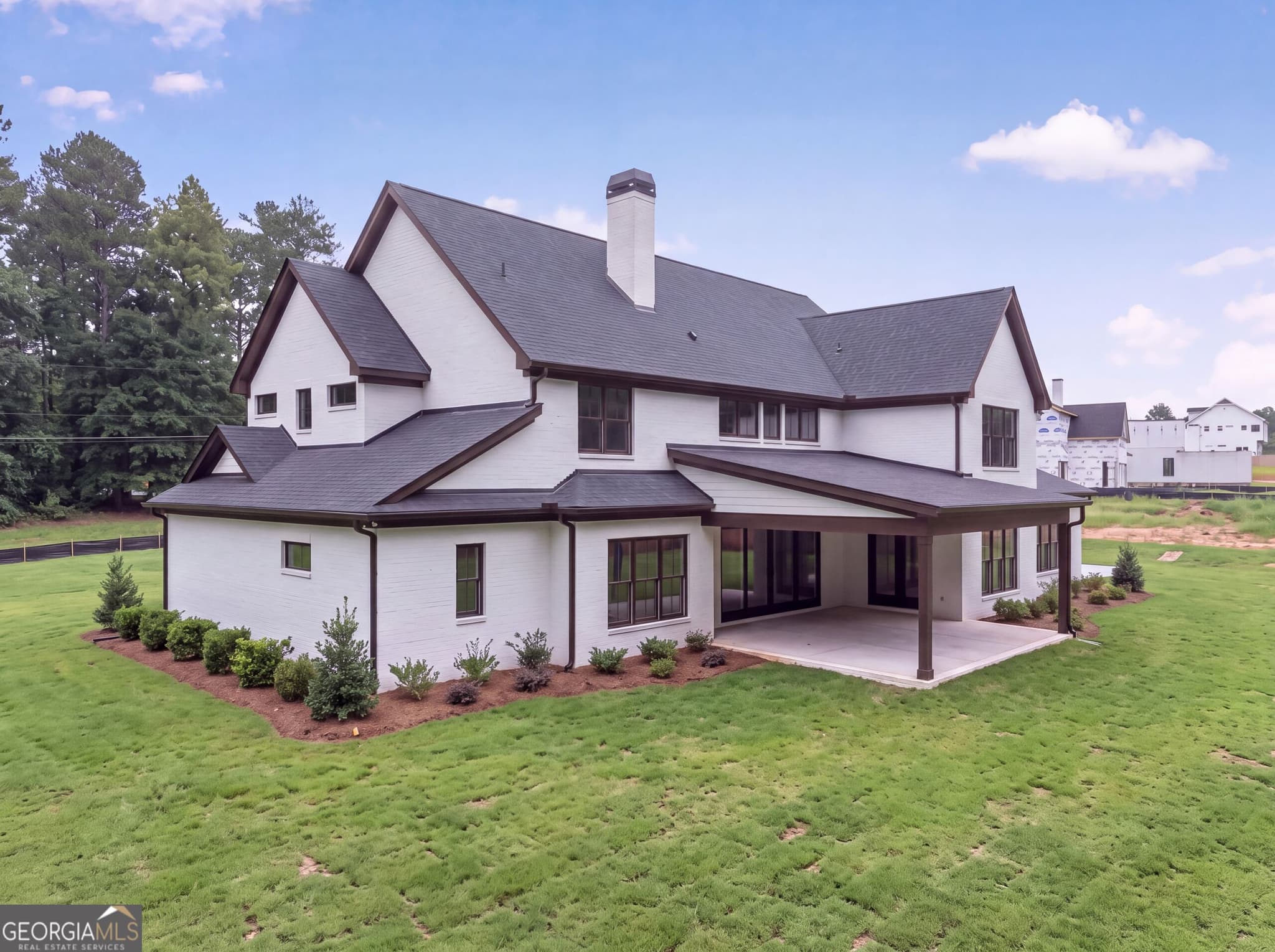 5 bedroom, 4.5 bathroom, 5,799 sq ft single family residence for sale at 616 Hoke Okelly Mill Road, Loganville, GA 30052 — photo 3